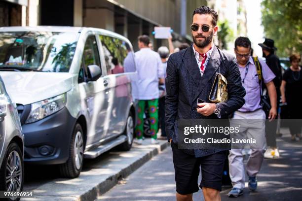 Matthew Zorpas, wearing blue jacket and bermuda, is seen in the streets of Milan after the Dolce Gabbana show, during Milan Men's Fashion Week...