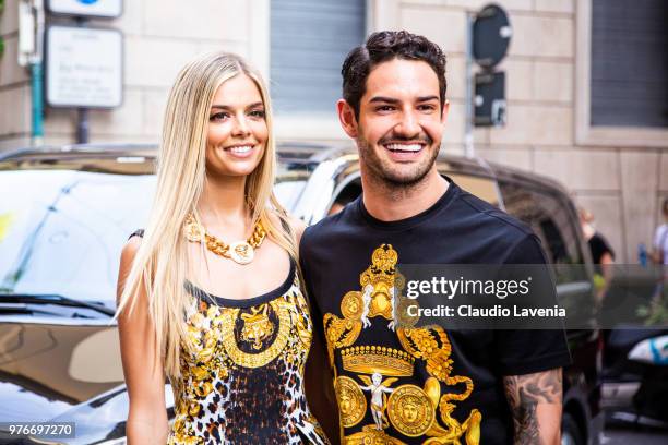 Alexandre Pato, wearing Versace t shirt and Danielle Knudson, wearing Versace dress, are seen in the streets of Milan before the Versace show, during...