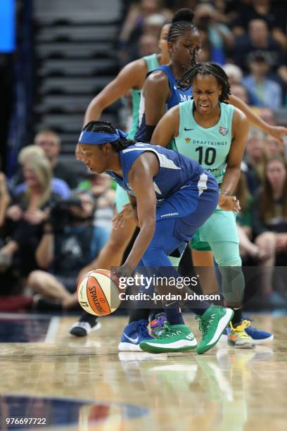 Alexis Jones of the Minnesota Lynx handles the ball against the New York Liberty on June 16, 2018 at Target Center in Minneapolis, Minnesota. NOTE TO...