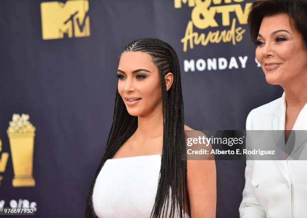 Personalities Kim Kardashian and Kris Jenner attend the 2018 MTV Movie And TV Awards at Barker Hangar on June 16, 2018 in Santa Monica, California.