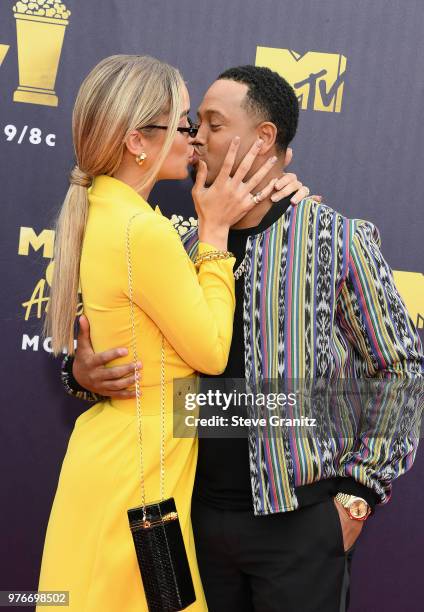 Actor Terrence J and Jasmine Sanders attends the 2018 MTV Movie And TV Awards at Barker Hangar on June 16, 2018 in Santa Monica, California.