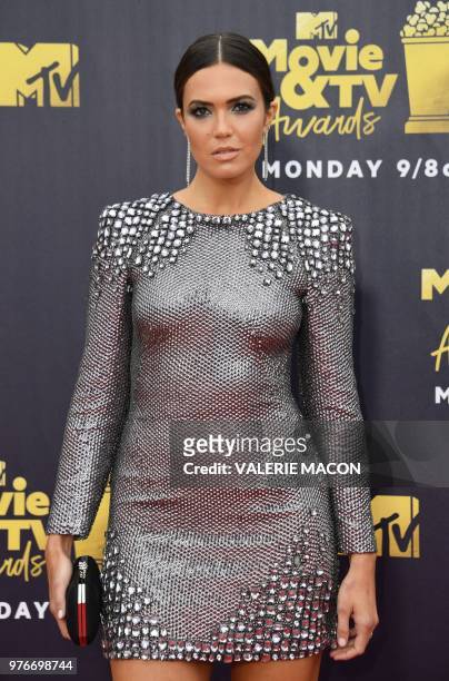 Actress/singer Mandy Moore attends the 2018 MTV Movie & TV awards, at the Barker Hangar in Santa Monica on June 16, 2018. - This year's show is not...