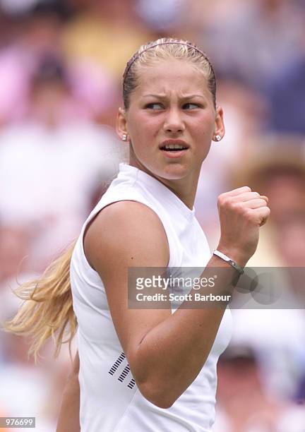 Anna Kournikova of Russia celebrates her victory after her first round match against Elena Bovina of Russia during the Adidas International Tennis...