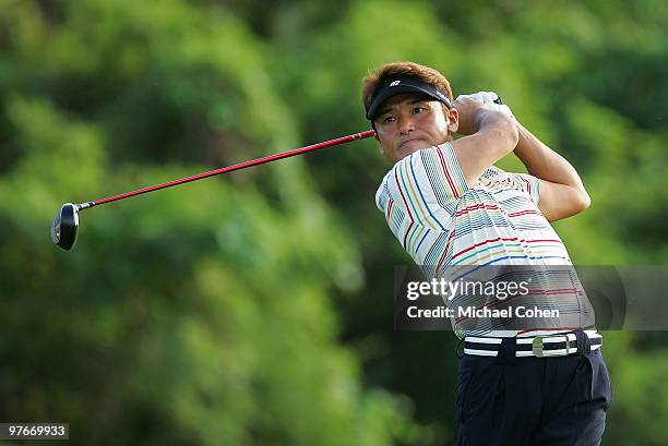 Shigeki Maruyama of Japan hits a drive during the continuation of the first round of the Puerto Rico Open presented by Banco Popular at Trump...
