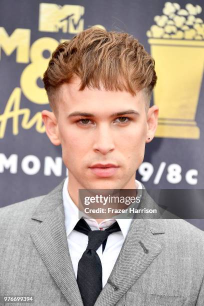 Actor Tommy Dorfman attends the 2018 MTV Movie And TV Awards at Barker Hangar on June 16, 2018 in Santa Monica, California.