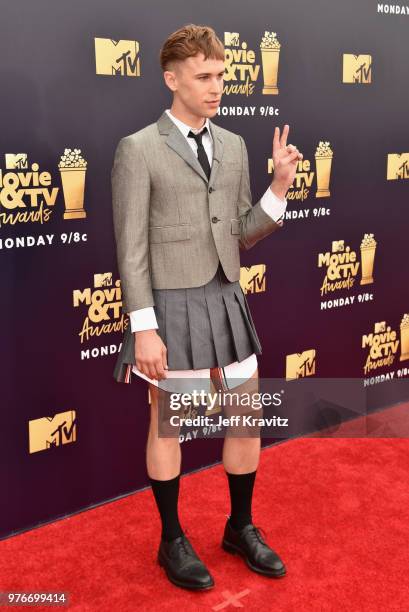 Actor Tommy Dorfman attends the 2018 MTV Movie And TV Awards at Barker Hangar on June 16, 2018 in Santa Monica, California.