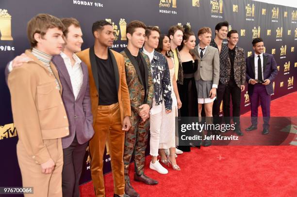 The cast of 13 Reasons Why attends the 2018 MTV Movie And TV Awards at Barker Hangar on June 16, 2018 in Santa Monica, California.