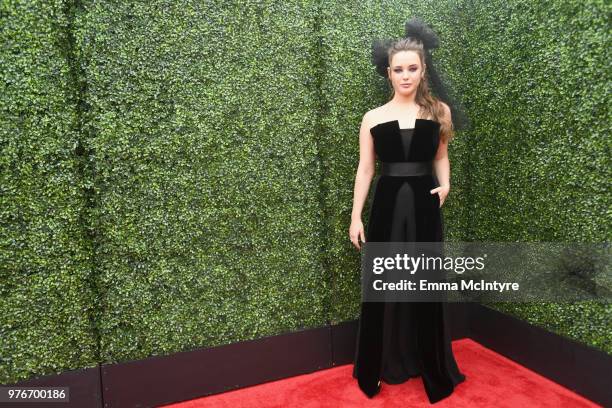 Actor Katherine Langford attends the 2018 MTV Movie And TV Awards at Barker Hangar on June 16, 2018 in Santa Monica, California.