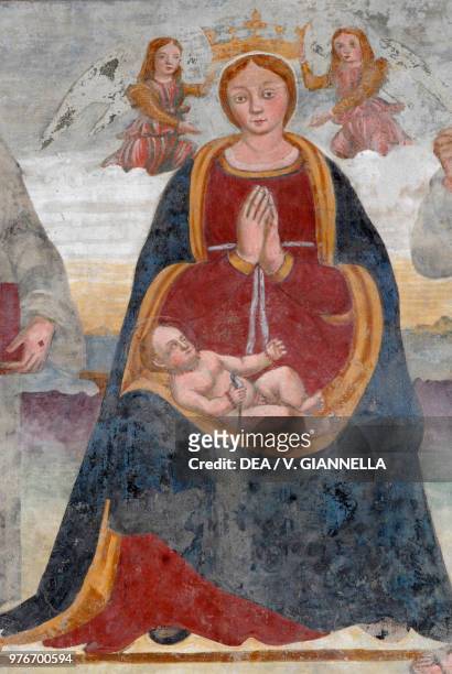 Madonna and Child, fresco in the church of Saint Michael Arcangel, Roncole Verdi, Emilia-Romagna, Italy, 16th century.