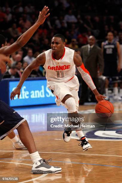 Scoop Jardine of the Syracuse Orange handles the ball during the quarterfinal of the 2010 NCAA Big East Tournament at Madison Square Garden on March...