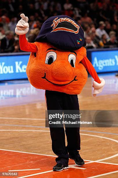 The Syracuse Orange mascot performs during the quarterfinal of the 2010 NCAA Big East Tournament at Madison Square Garden on March 11, 2010 in New...