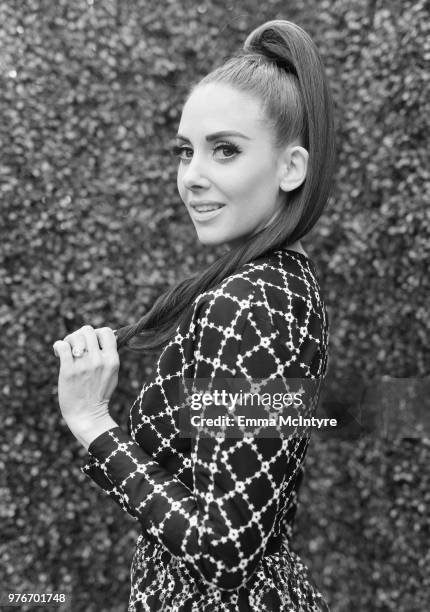 Actor Alison Brie attends the 2018 MTV Movie And TV Awards at Barker Hangar on June 16, 2018 in Santa Monica, California.