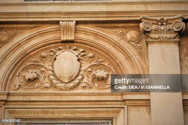 Portal with floral reliefs, Marsala, Sicily, Italy.
