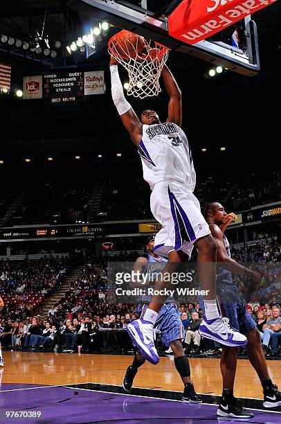 Jason Thompson of the Sacramento Kings slam dunks during the game against the Charlotte Bobcats on January 30, 2010 at Arco Arena in Sacramento,...