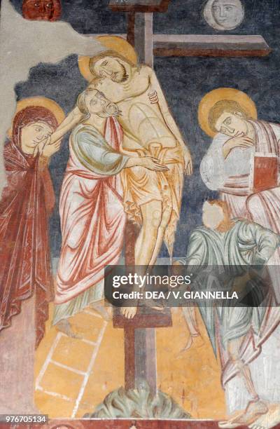 Jesus brought down from the cross, fresco in the chapel of Saint Aquilinus, basilica of Saint Lawrence, Milan, Lombardy, Italy.