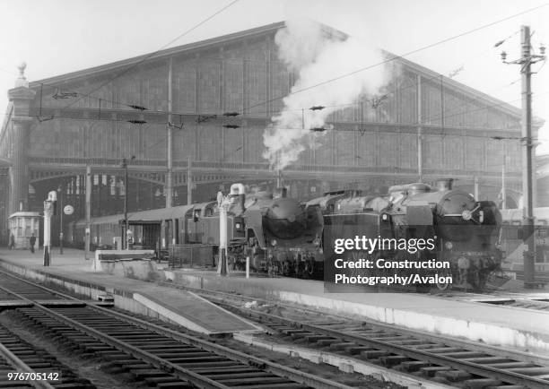 Fine view of a brace of Class 141TCs standing at Paris, Bastille. 1970.