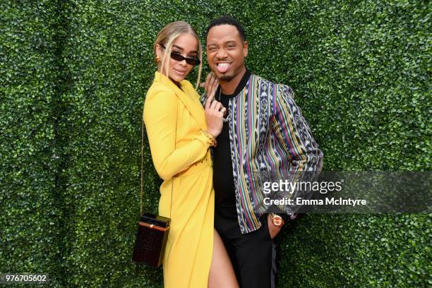 Model Jasmine Sanders and actor Terrence J attend the 2018 MTV Movie And TV Awards at Barker Hangar on June 16, 2018 in Santa Monica, California.