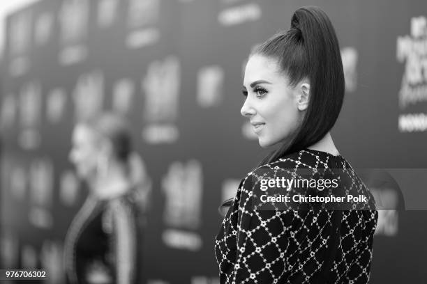 Actor Alison Brie attends the 2018 MTV Movie And TV Awards at Barker Hangar on June 16, 2018 in Santa Monica, California.