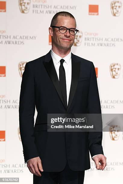 Guy Pearce poses in the press room at The Orange British Academy Film Awards 2010 at The Royal Opera House on February 21, 2010 in London, England.