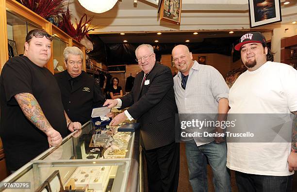 Corey Harrison, Richard Harrison, Las Vegas Mayor Oscar Goodman, Rick Harrison and Austin "Chumlee" Russell receive the key to Las Vegas from Las...