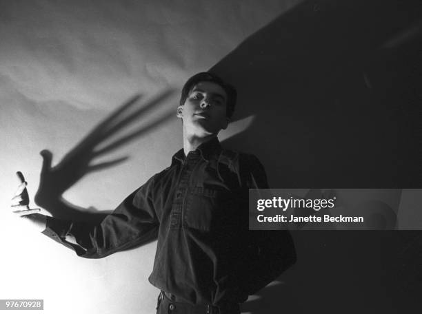 British avant-garde musician and vocalist Fad Gadget aka Francis John Tovey sings in to a microphone in 1981 in London, England.