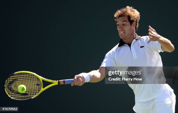 Richard Gasquet of France hits a forehand in his match against Simon Greul of Germany during the BNP Paribas Open at the Indian Wells Tennis Garden...