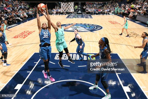 Rebekkah Brunson of the Minnesota Lynx handles the ball against Kia Vaughn of the New York Liberty on June 16, 2018 at Target Center in Minneapolis,...