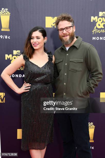 Actor Seth Rogen and Lauren Miller attend the 2018 MTV Movie And TV Awards at Barker Hangar on June 16, 2018 in Santa Monica, California.