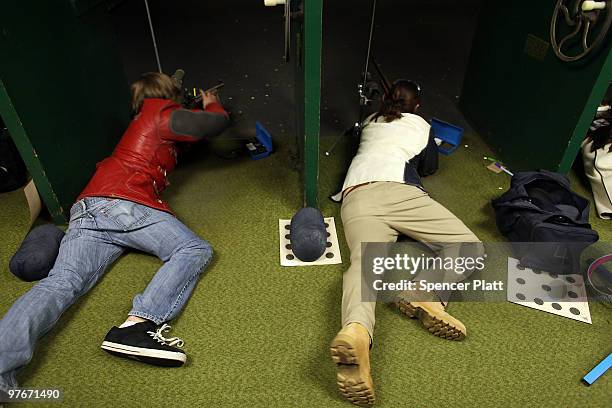 Student competitors shoot during the 79th Anniversary Gallery Match for area high school students at the Blue Trail Range on March 12, 2010 in...