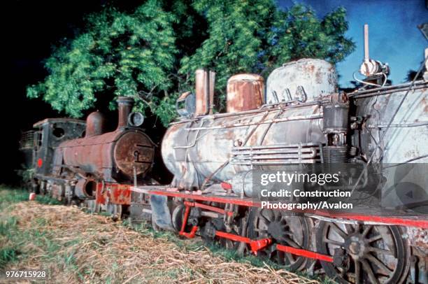 Abandoned engines at Santa Fe on Argentina's Belgrano Railway on the right is an 8A Class Prairie 2-6-2 built by Societe Suisse in 1909 and on the...