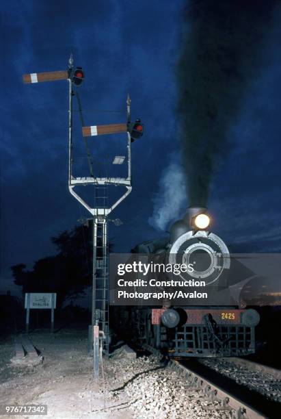 Chalisa Junction at Sundown with a Pakistan Railway's SGS Class inside cylinder 0-6-0 at the head of a mixed train from Dandot to Malakwal which...