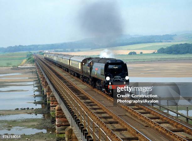 Cumbrian Coast Express. No 34092 City Of Wells crosses Eskmeals Viaduct on the return trip from Sellafield to Carnforth. . , United Kingdom.