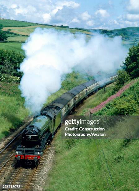 Cumbrian Coast Express. No 4472 Flying Scotsman climbs Lindal Bank at Pennington en route for Dalton. , United Kingdom.