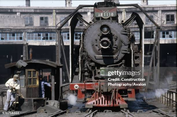 During the 1980s passenger train on China's Changchun - Jilin line were operated by these superb RM Clan Pacific 4-6-2s. Here No 1118 is being turned...