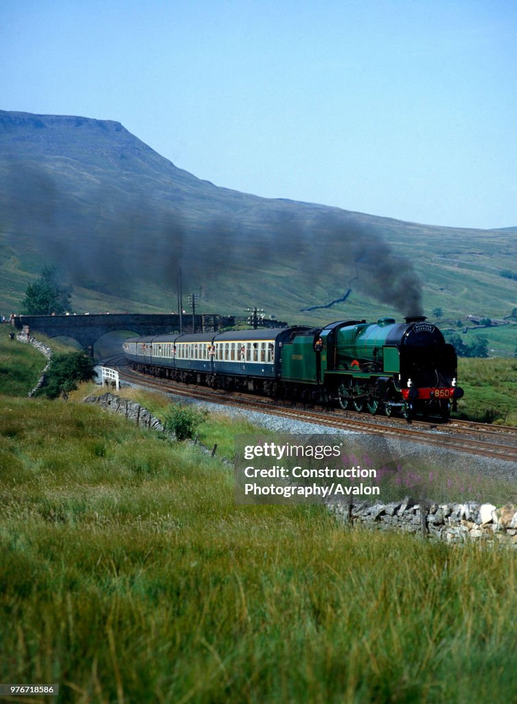 Cumbrian Mountain Express.No. 850 Lord Nelson heads south at Ais Gill summit. Wild Boar Fell in background. 03.06.1987.