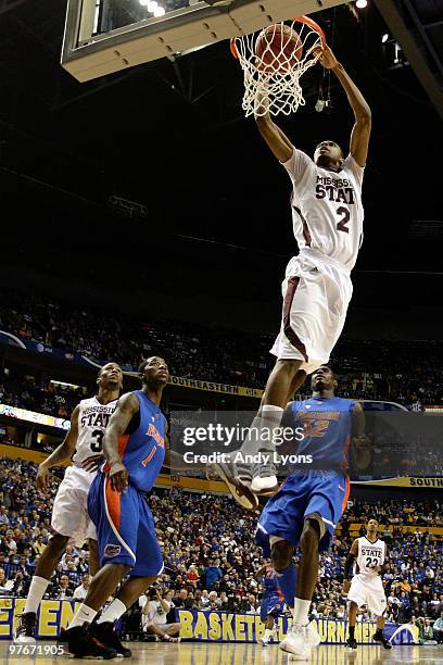 Ravern Johnson of the Mississippi State Bulldogs dunks against the Florida Gators during the quarterfinals of the SEC Men's Basketball Tournament at...