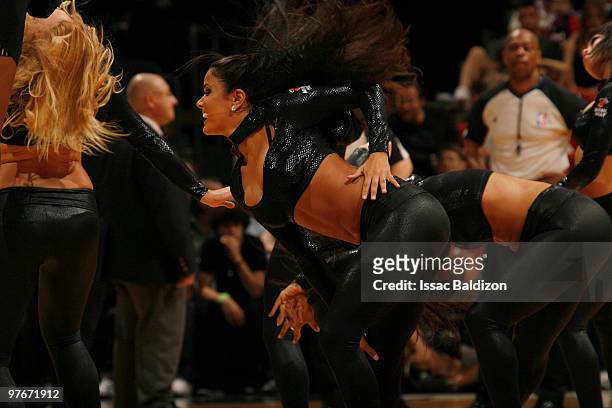Miami Heat dancers perform on March 12, 2010 at American Airlines Arena in Miami, Florida. NOTE TO USER: User expressly acknowledges and agrees that,...
