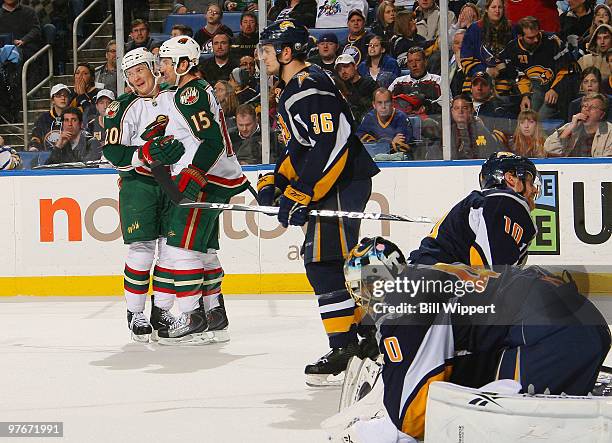 Antti Miettinen of the Minnesota Wild celebrates his second period goal with teammate Andrew Brunette of the Minnesota Wild in front of Patrick...