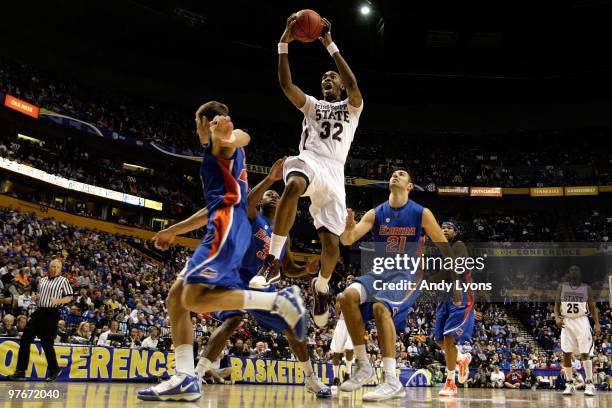 Jarvis Varnado of the Mississippi State Bulldogs drives for a shot attempt against the Florida Gators during the quarterfinals of the SEC Men's...