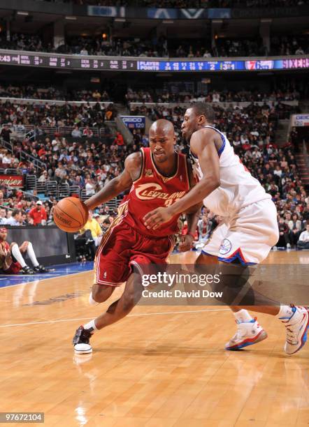 Jawad Williams of the Cleveland Cavaliers drives against Thaddeus Young of the Philadelphia 76ers during the game on March 12, 2010 at the Wachovia...