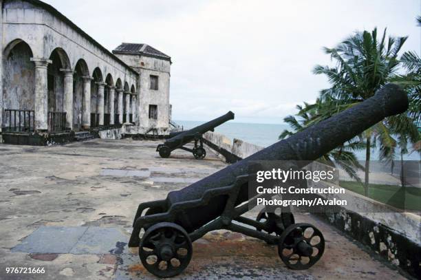 Gold Coast Slaving Fort. Canons at Elmina Castle the vile slaving fort from which slave were shipped to the New World during the 18/19 centuries....