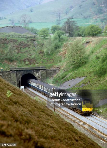 Hope Valley. No 31.188 leaves Cowburn Tunnel with the 10:41 ex Manchester for Sheffield. . , United Kingdom.