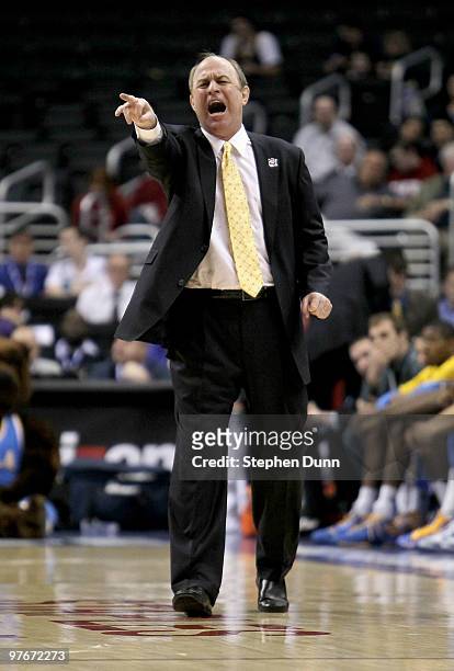 Head coach Ben Howland of the UCLA Bruins shouts instructions during the game with the California Golden Bears during the semifinals of the Pac-10...