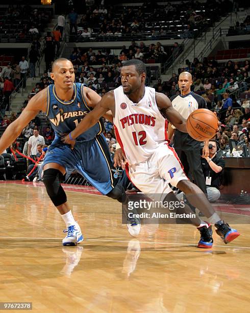 Will Bynum of the Detroit Pistons drives around Randy Foye of the Washington Wizards in a game at the Palace of Auburn Hills on March 12, 2010 in...