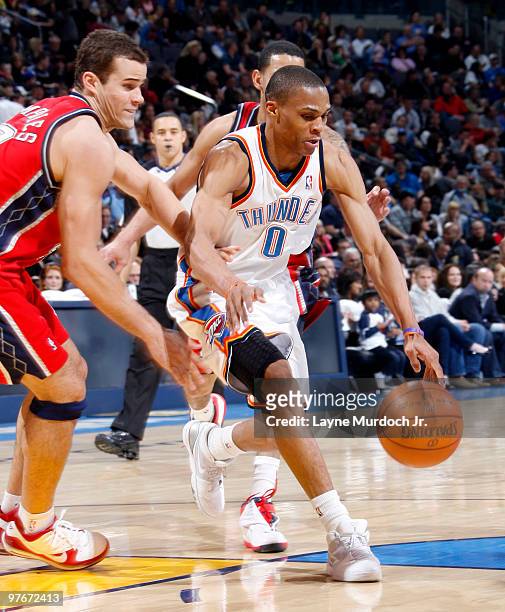 Russell Westbrook of the Oklahoma City Thunder drives to the basket against Kris Humphries of the New Jersey Nets on March 12, 2010 at the Ford...