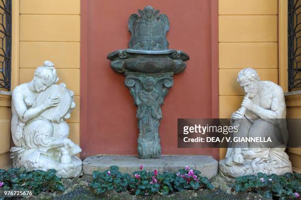 Statues and small fountain adorning a nook of Villa Durazzo, Santa Margherita Ligure, Liguria, Italy.