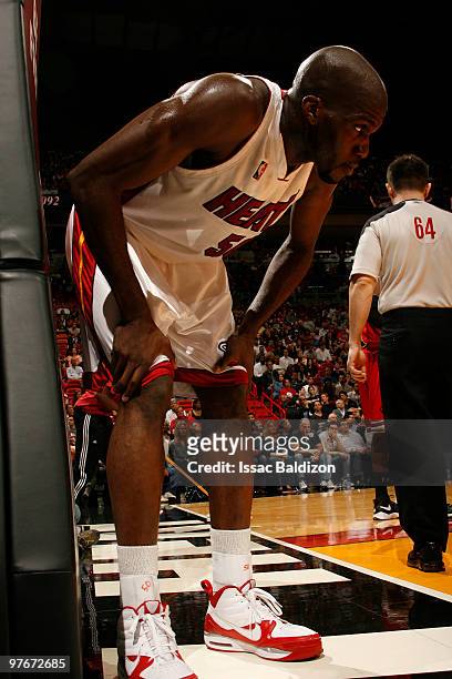 Joel Anthony of the Miami Heat takes a breather against the Chicago Bulls on March 12, 2010 at American Airlines Arena in Miami, Florida. NOTE TO...