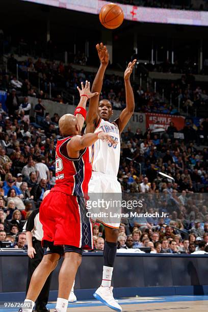 Kevin Durant of the Oklahoma City Thunder shoots a jump shot and sets a franchise record of having the most 30-point games, while being guarded by...