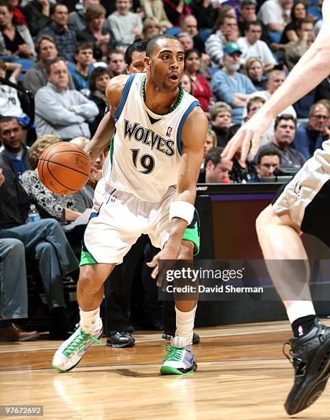 Wayne Ellington of the Minnesota Timberwolves looks to pass the ball against Matt Bonner of the San Antonio Spurs during the game on March 12, 2010...