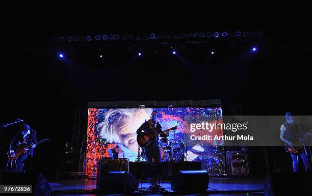 Guitarist Steve Mazur, singer Raine Maida, drummer Jeremy Taggart and bassist Duncan Coutts of Our Lady Peace perform at Massey Hall during Canadian...